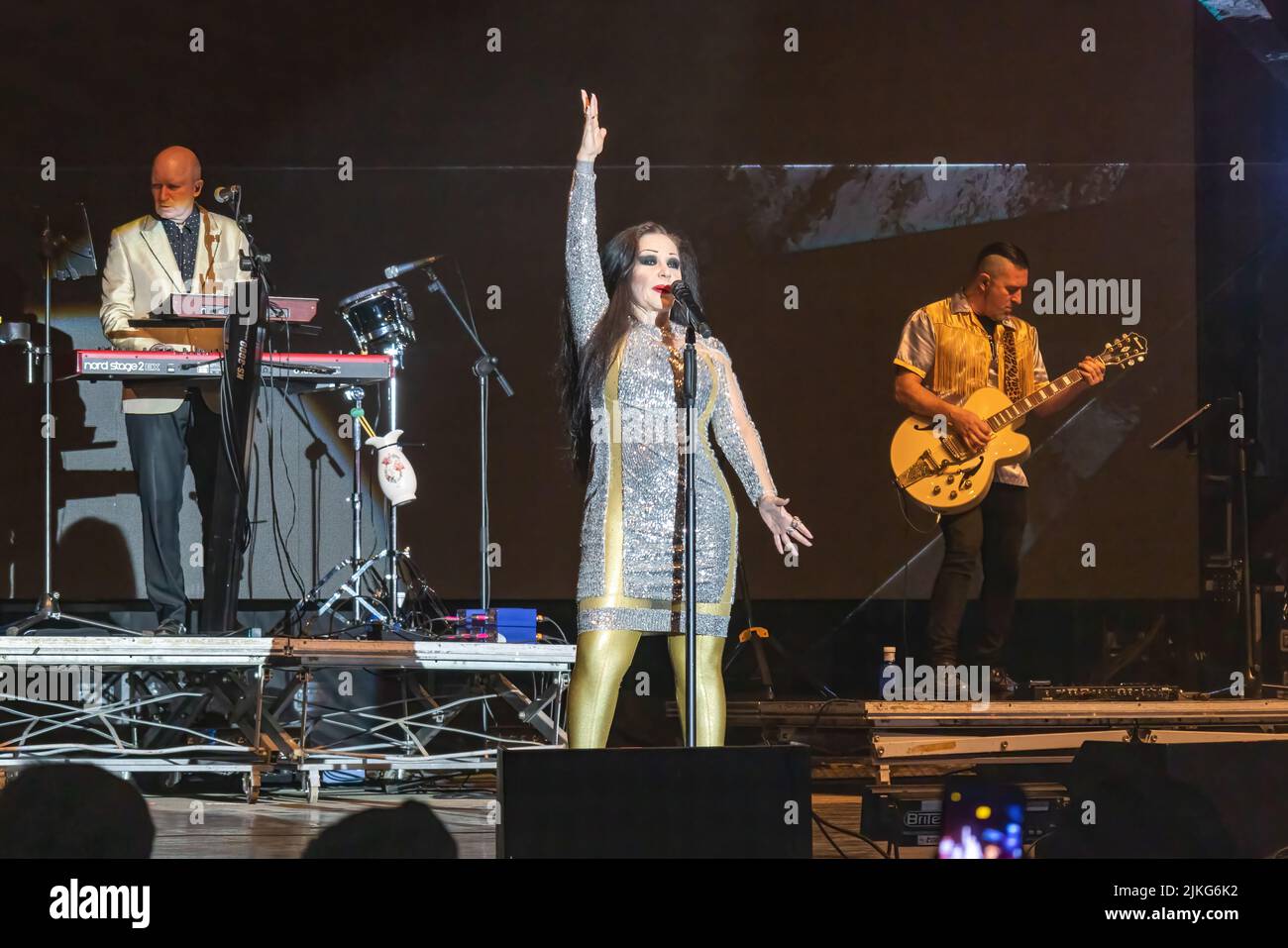 Huelva, Spain - August 1, 2022: The singer Alaska (Olvido Gara Jova) with the band Fangoria in a concert at the Huelva Colombian festival Stock Photo