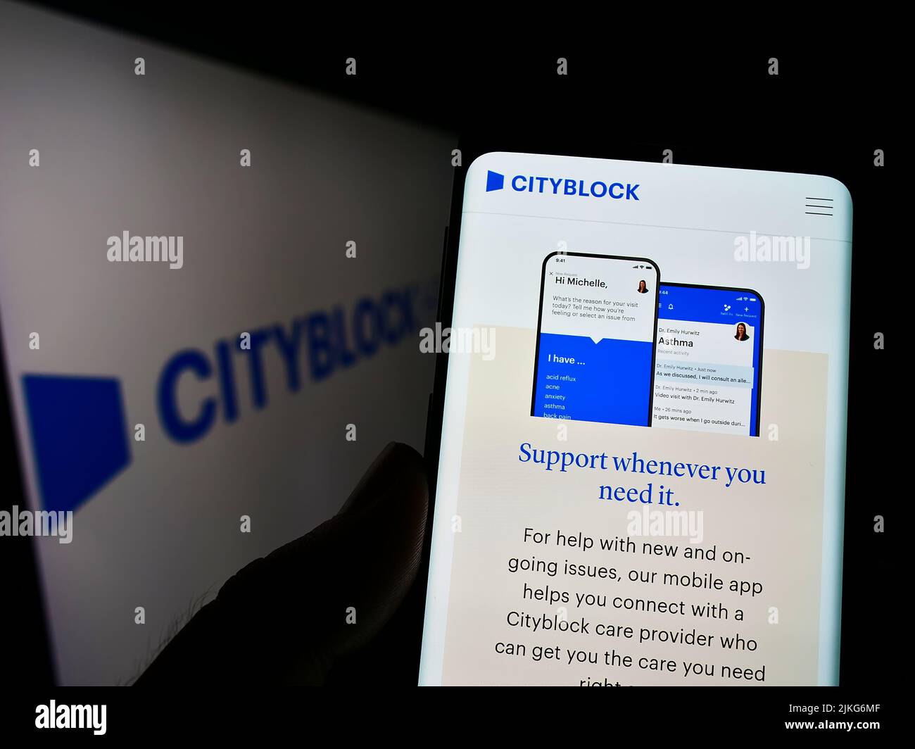 Person holding cellphone with webpage of US healthcare company Cityblock Health Inc. on screen in front of logo. Focus on center of phone display. Stock Photo