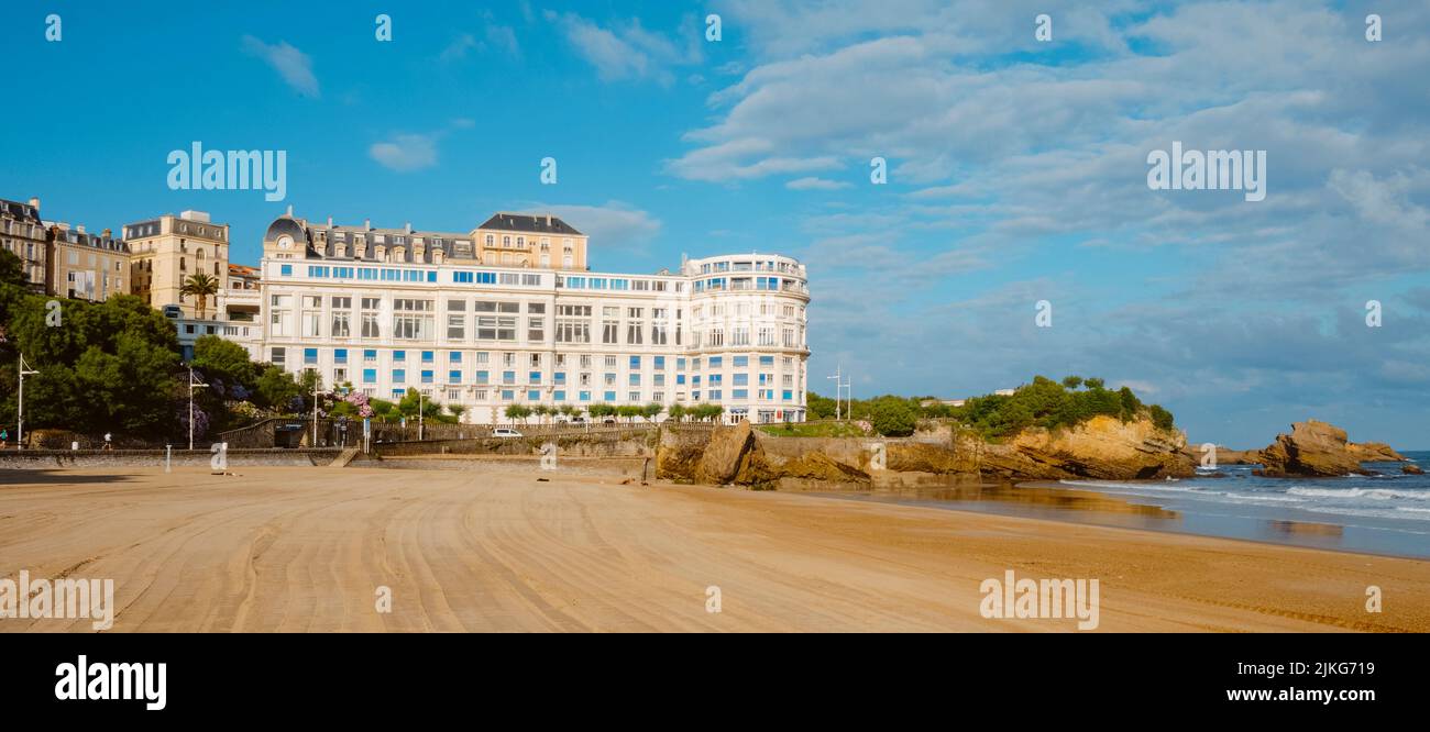 Biarritz, France - June 24, 2022: The southernmost side of La Grande Plage beach in Biarritz, highlighting the Bellevue convention center and Casino a Stock Photo