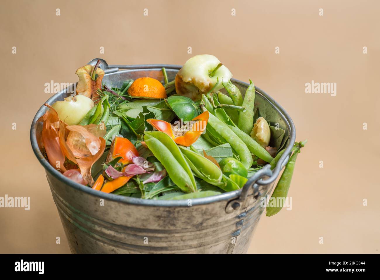 Sorted organic kitchen waste in compostbucket. Sustainable life style