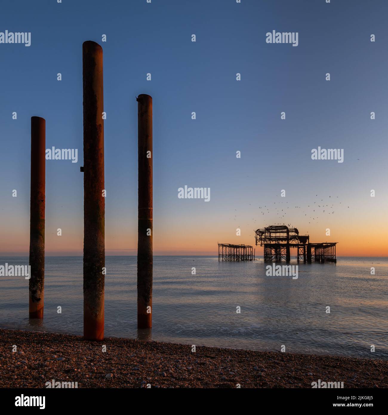 The ruin of the old West Pier in the English Channel off the coast of Brighton and Hove, East Sussex, England Stock Photo