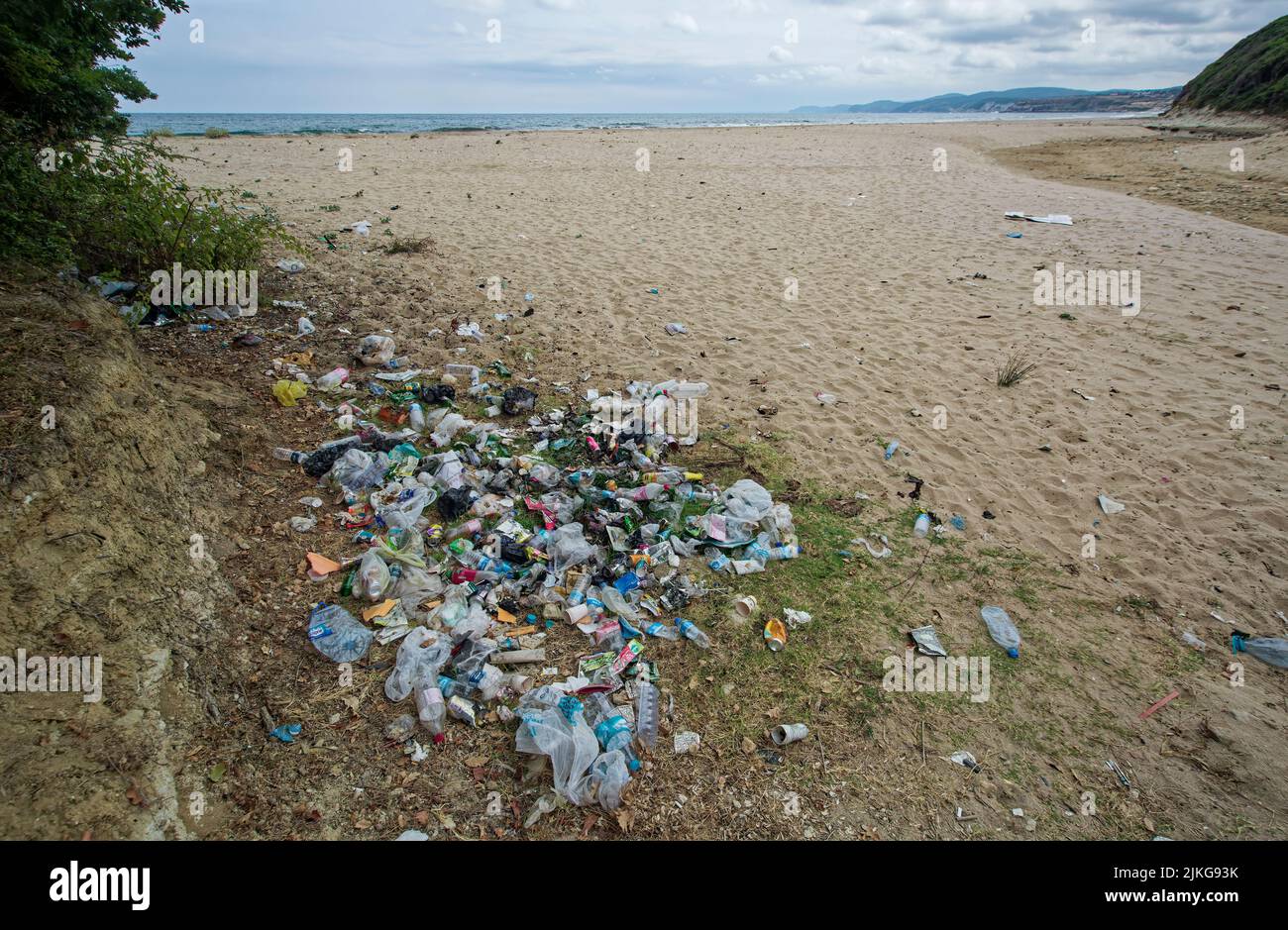 Garbage disposed to empty sandy beach. Kiyikoy, Black Sea Cost of Turkey. Stock Photo
