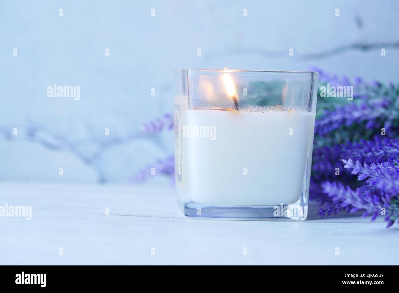 Burning scented candles for relax on black background  Stock Photo