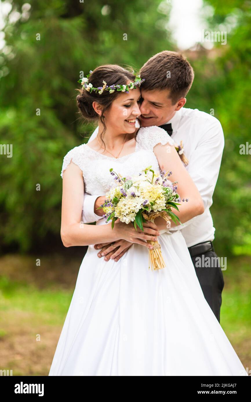 Happy bride and groom after wedding ceremony Stock Photo - Alamy