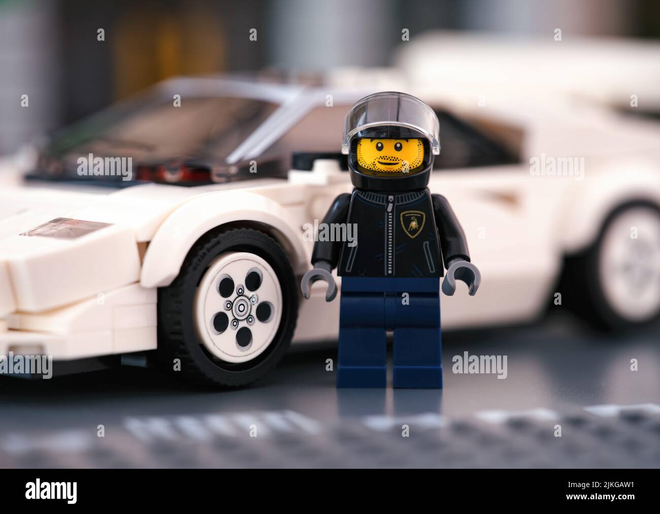 Tambov, Russian Federation - June 21, 2022 A Lego driver minifigure standing near his Lamborghini Countach car by LEGO Speed Champions Stock Photo