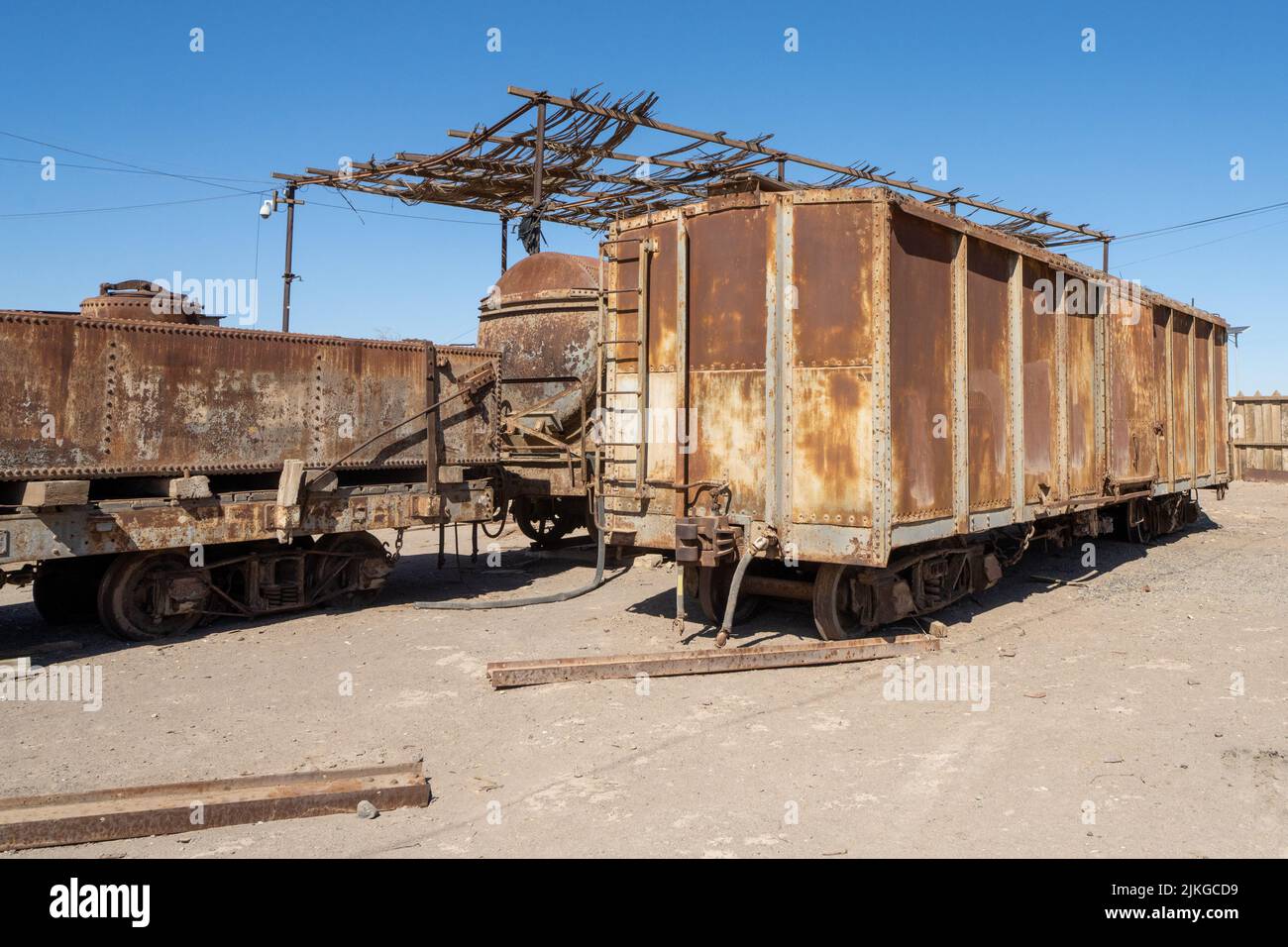 Outdoor museum display of an old railroad cars used in the saltpeter