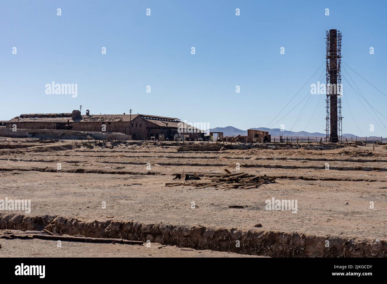 The main leaching plant and smokestack in the outdoor museum of the saltpeter works at Humberstone, Chile. Stock Photo