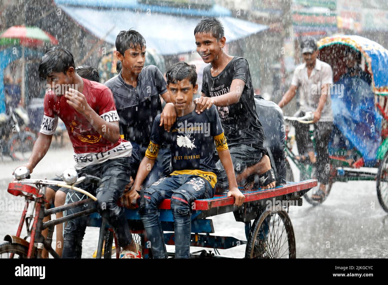 Dhaka, Bangladesh - August 02, 2022: People walk through the Mugda para ...