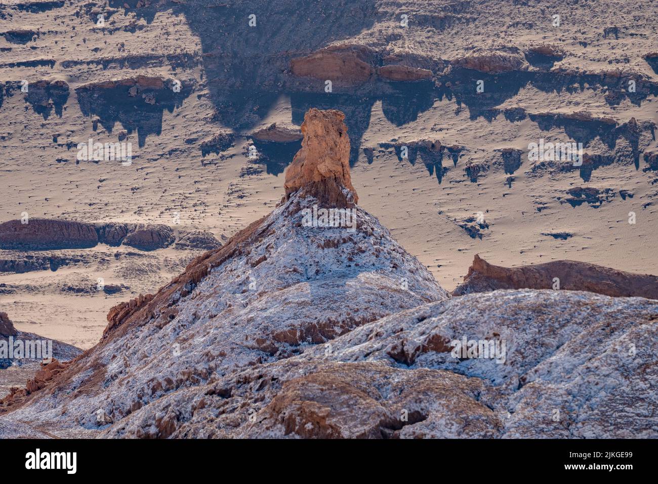 Salt deposits on siltstone rock formations in the Valley of the Moon or Valle de Luna near San Pedro de Atacama, Chile. Stock Photo