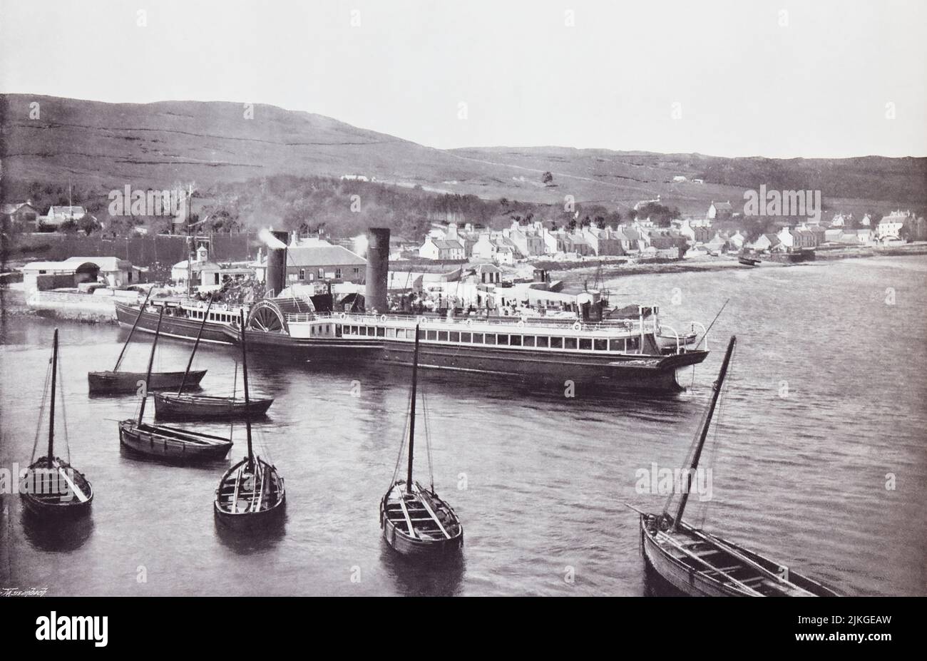 Ardrishaig, Loch Gilp, Argyll and Bute, west of Scotland.  The steamer Columba at Ardrishaig Quay, seen here in the 19th century.  From Around The Coast,  An Album of Pictures from Photographs of the Chief Seaside Places of Interest in Great Britain and Ireland published London, 1895, by George Newnes Limited. Stock Photo