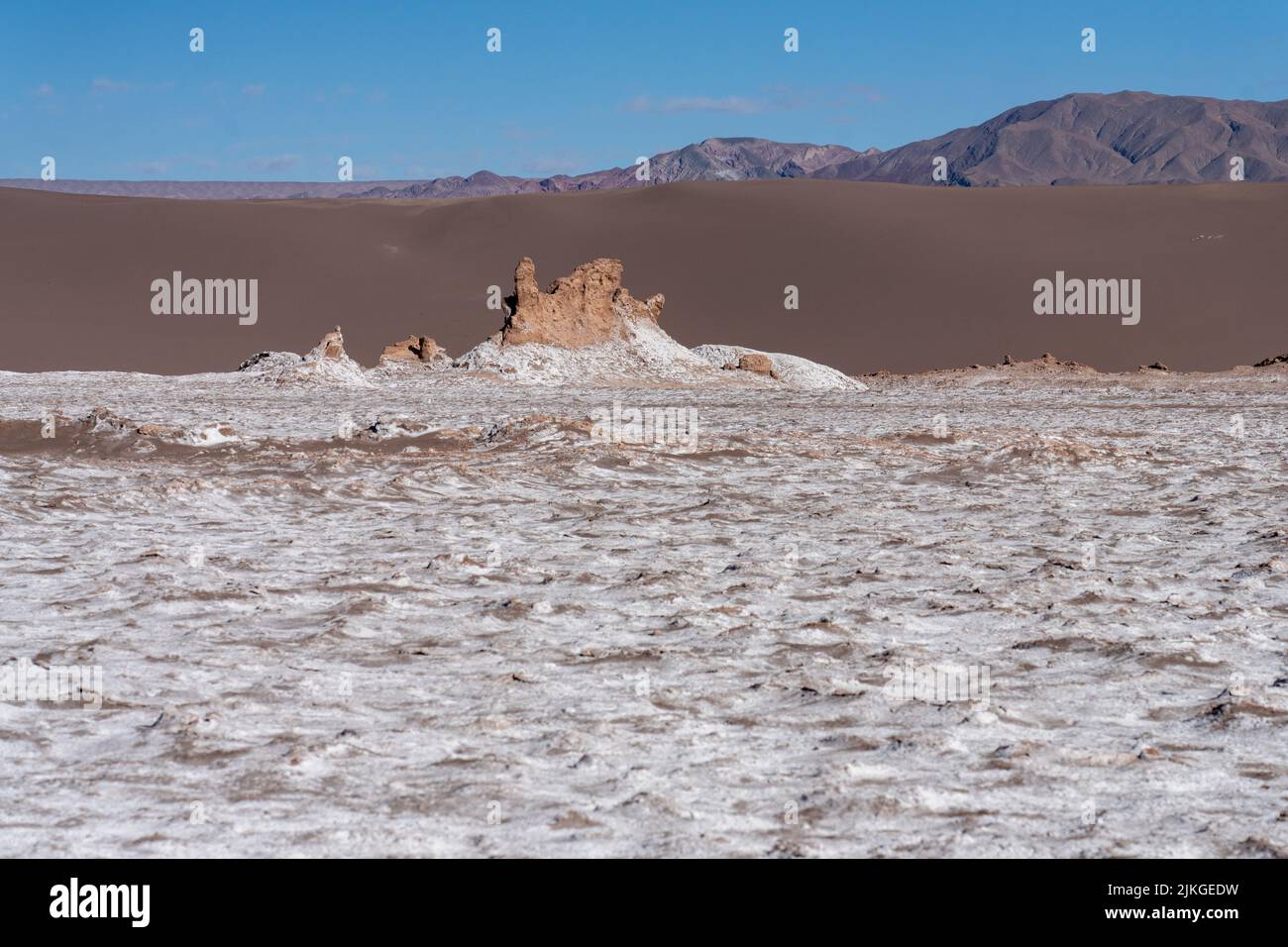 Evaporated salt flats and sand dunes in the Valley of the Moon or Valle de Luna. San Pedro de Atacama, Chile. Stock Photo