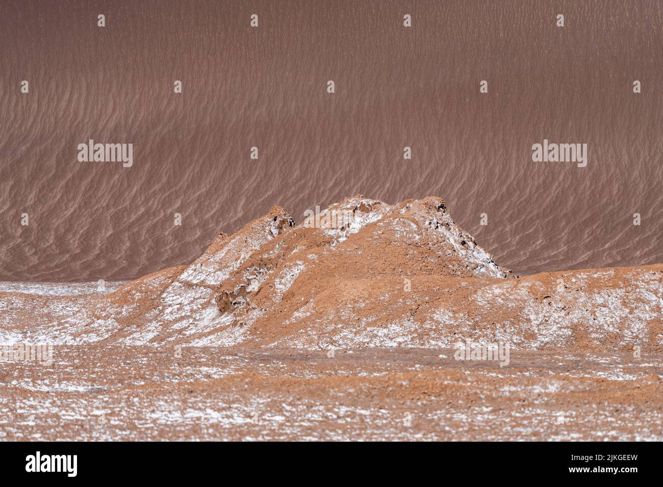 Sand dunes and siltstone formations in the Salt Mountains in the Valley of the Moon or Valle de Luna. San Pedro de Atacama, Chile. Stock Photo