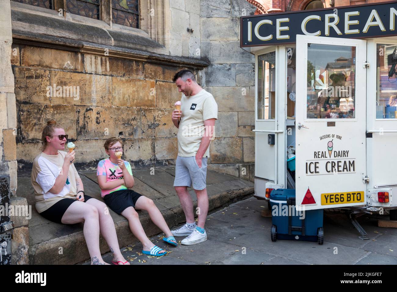 Eating icecream during the heatwave, York.  Summer Heatwave in York. A new UK record temperature, of 40.3C was set during the day in Lincolnshire . York,  2022, UK. Stock Photo