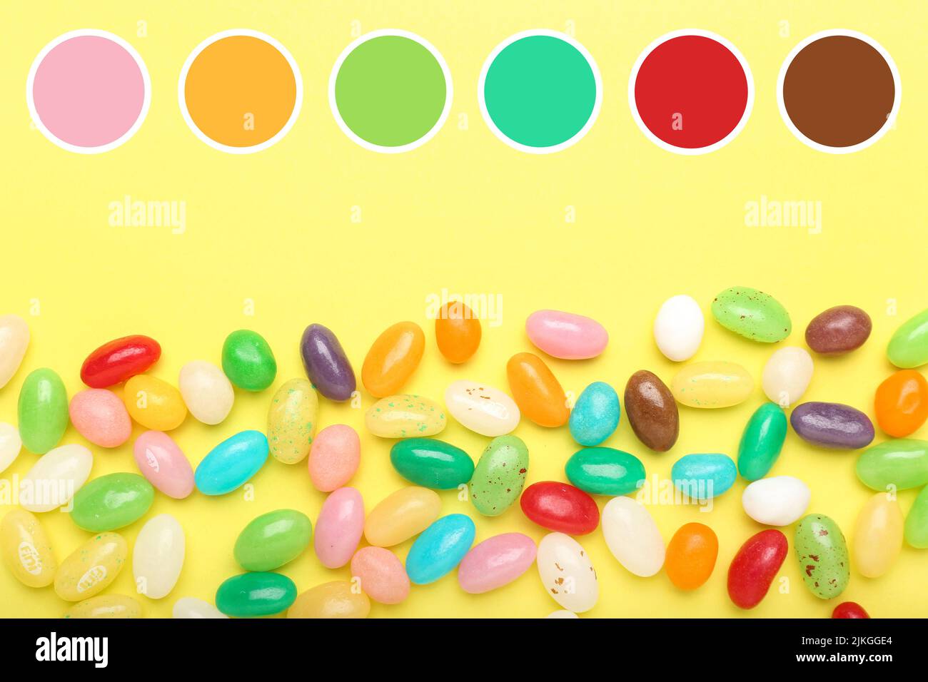 Sweet candies on yellow background. Different color patterns Stock ...
