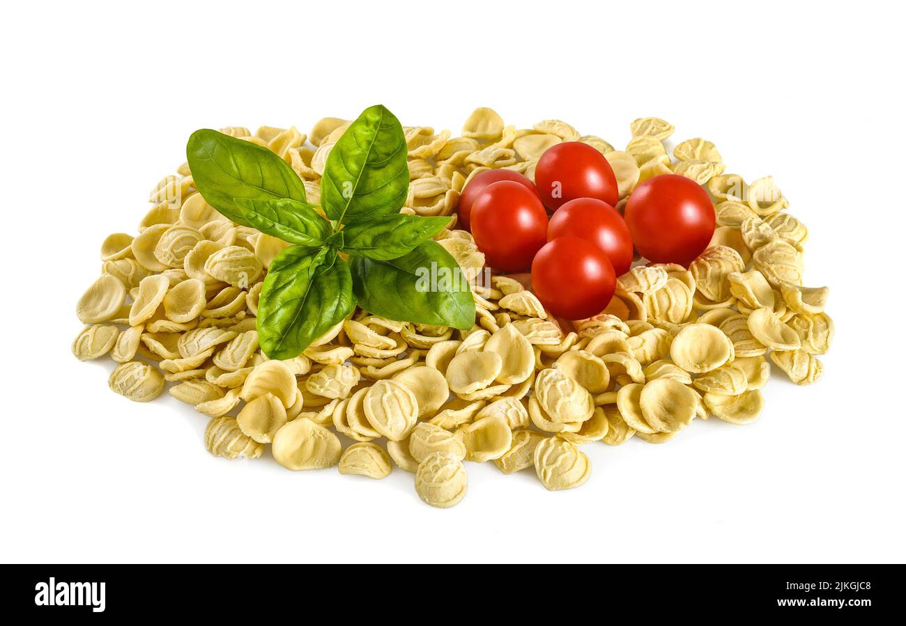 Orecchiette tomatoes and basil isolated on white Stock Photo