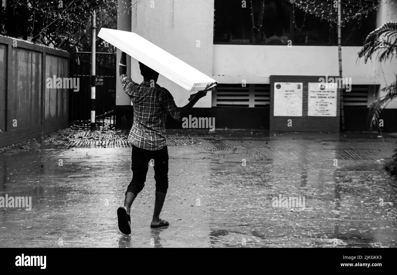 Rainy day candid photography. This image was captured on 2022-08-02, from Dhaka, Bangladesh, South Asia Stock Photo