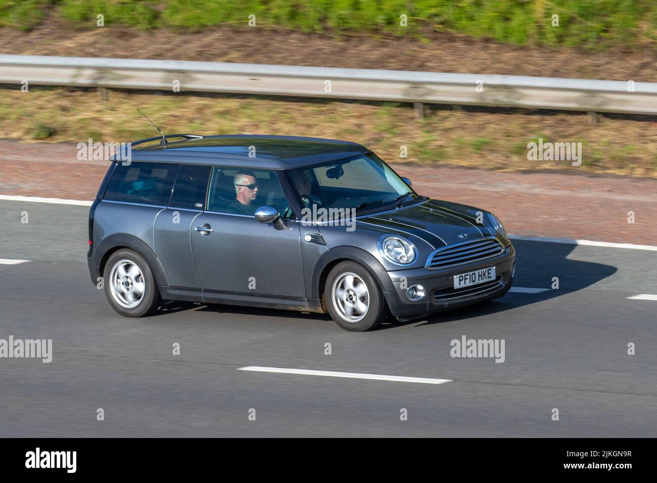 2010 Mini One Graphite Clubman, Estate Petrol 1598 cc sport utility vehicle, travelling on the M6 Motorway, Manchester, UK Stock Photo