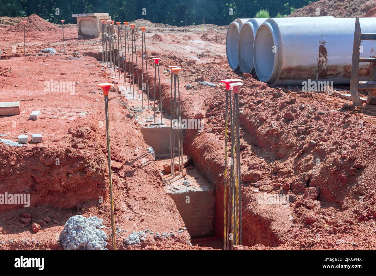 Concrete trenches are usually poured as the foundation for a house by
