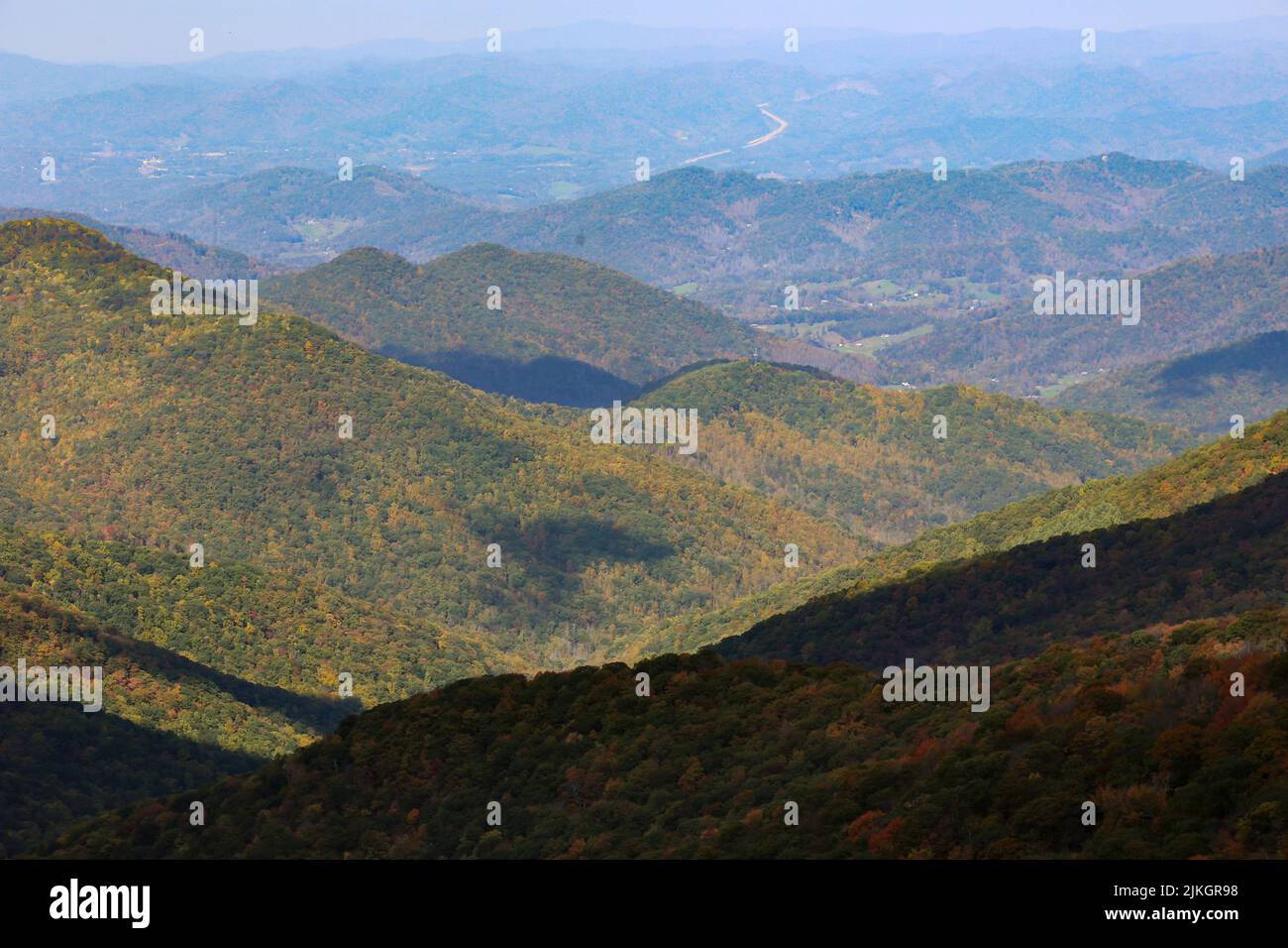An aerial view of a beautiful forest near the mountains Stock Photo - Alamy