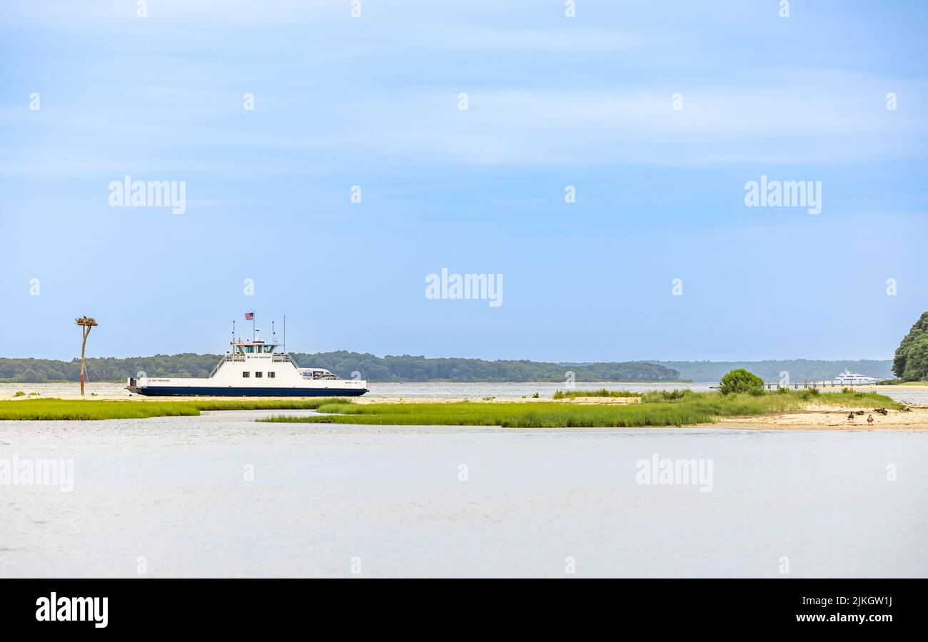 Shelter Island ferry with wet lands in the foreground Stock Photo