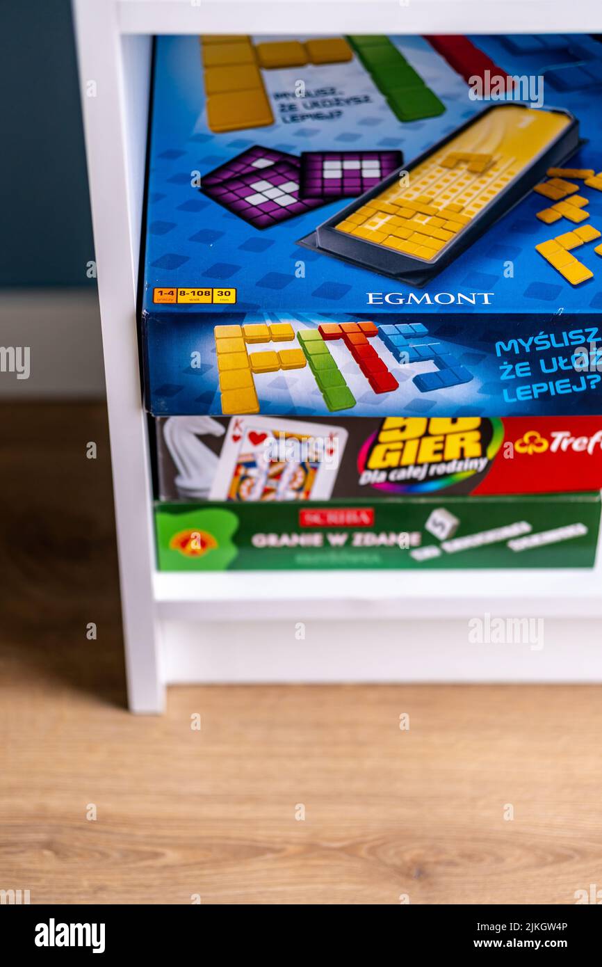 A vertical closeup shot of Egmont brand Fits game in a box on a wooden shelf Stock Photo