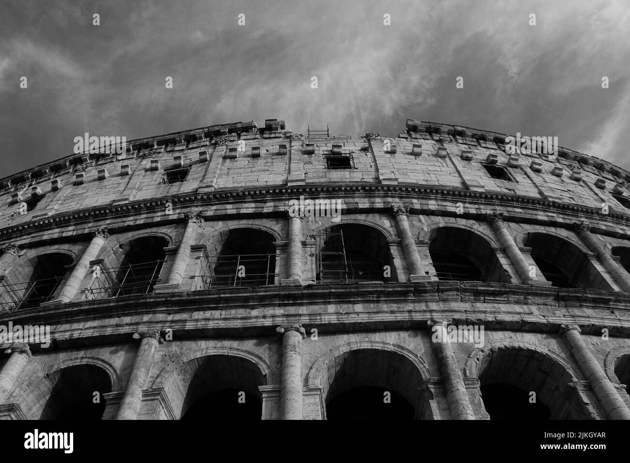 close-up of part of the facade of the coliseum in black and white Stock ...