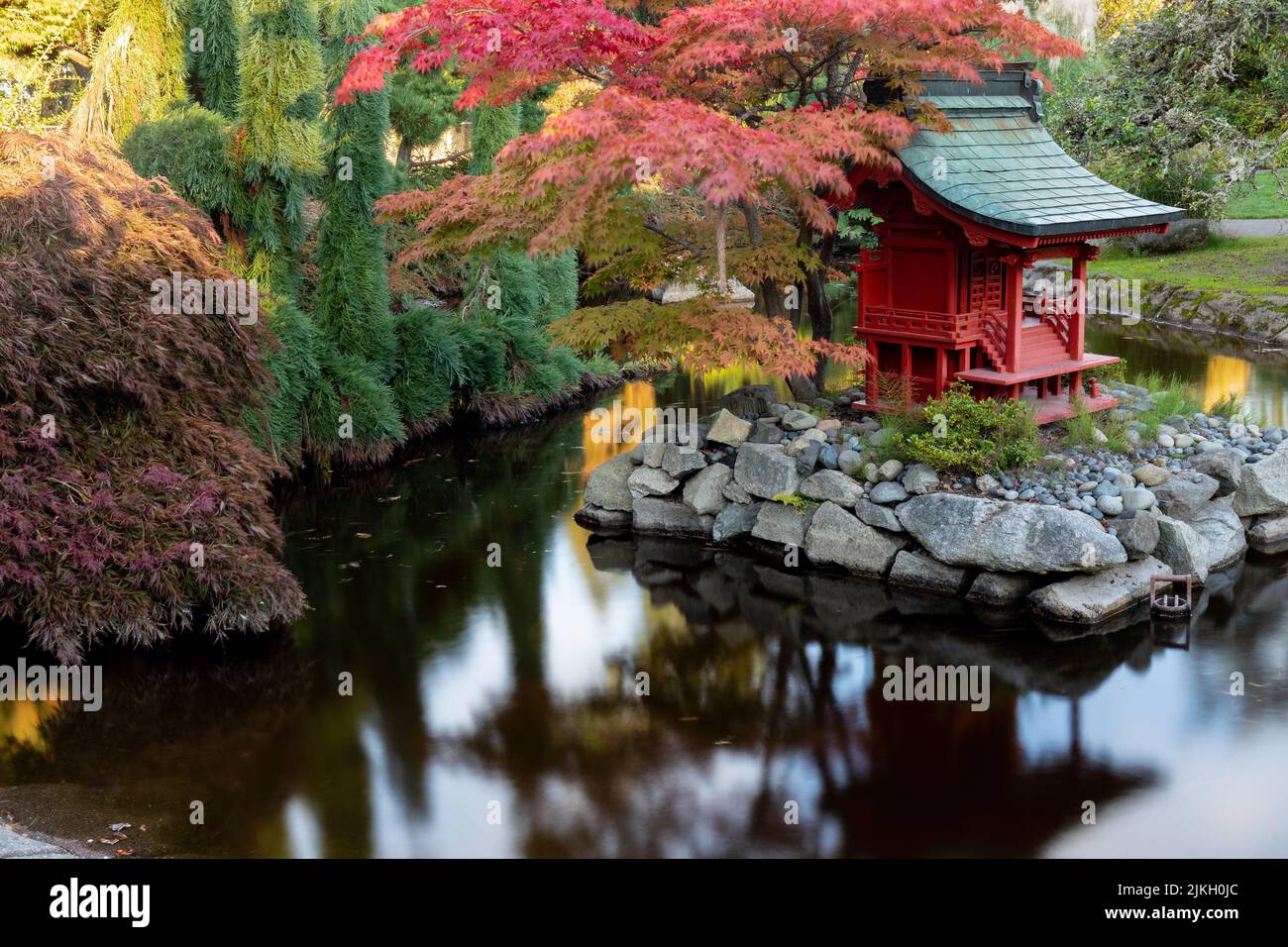 Red Pagoda in Japanese Garden Pond in Point Defiance Park, Tacoma, WA Stock Photo
