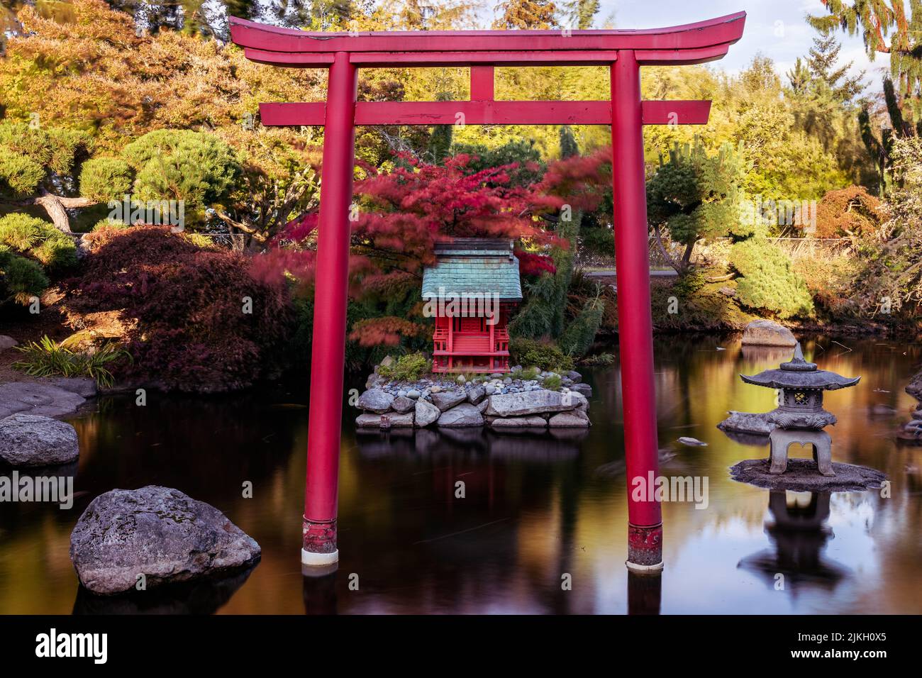 Red Torii Gate and Pagoda in Japanese Garden Pond in Point Defiance Park, Tacoma, WA Stock Photo