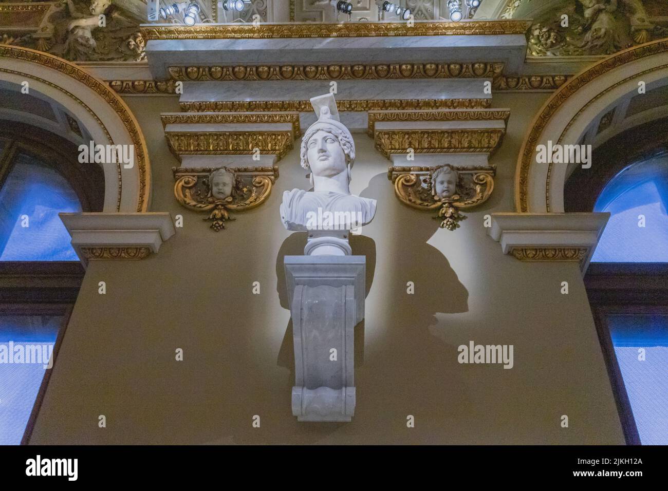A low angle shot of an ancient bust in Art History Museum, Vienna
