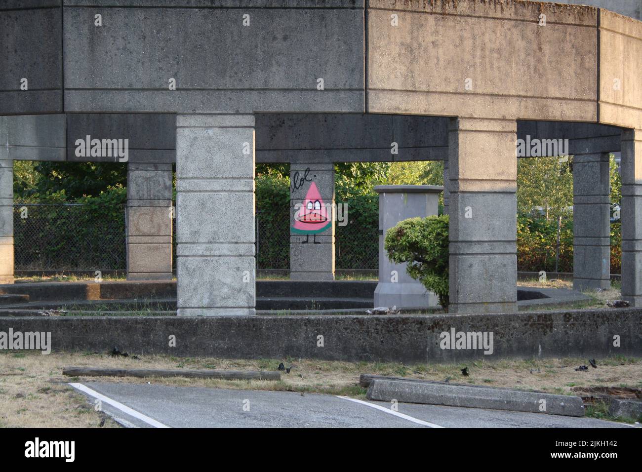 a graffiti on a concrete structure in East Vancouver, British Columbia, Canada Stock Photo