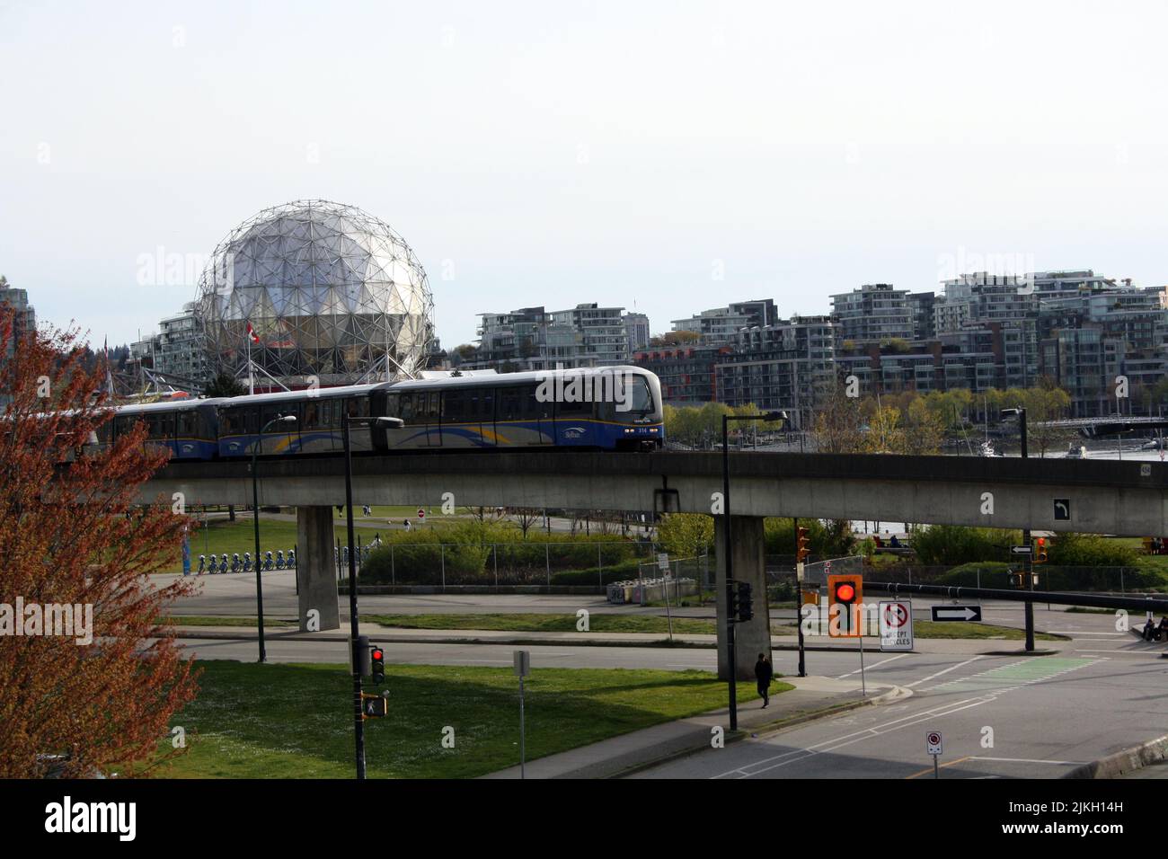 A Sky Train passing Science World Centre in downtown Vancouver, British Columbia, Canada Stock Photo