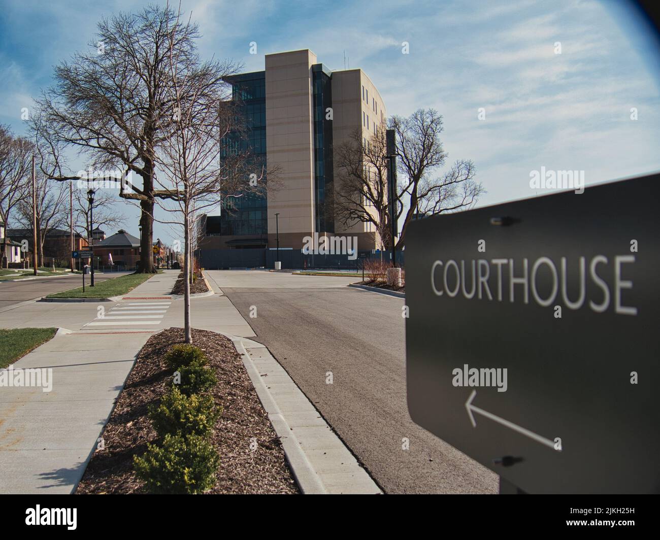 A view of a sign showing the location of the Johnson County Courthouse