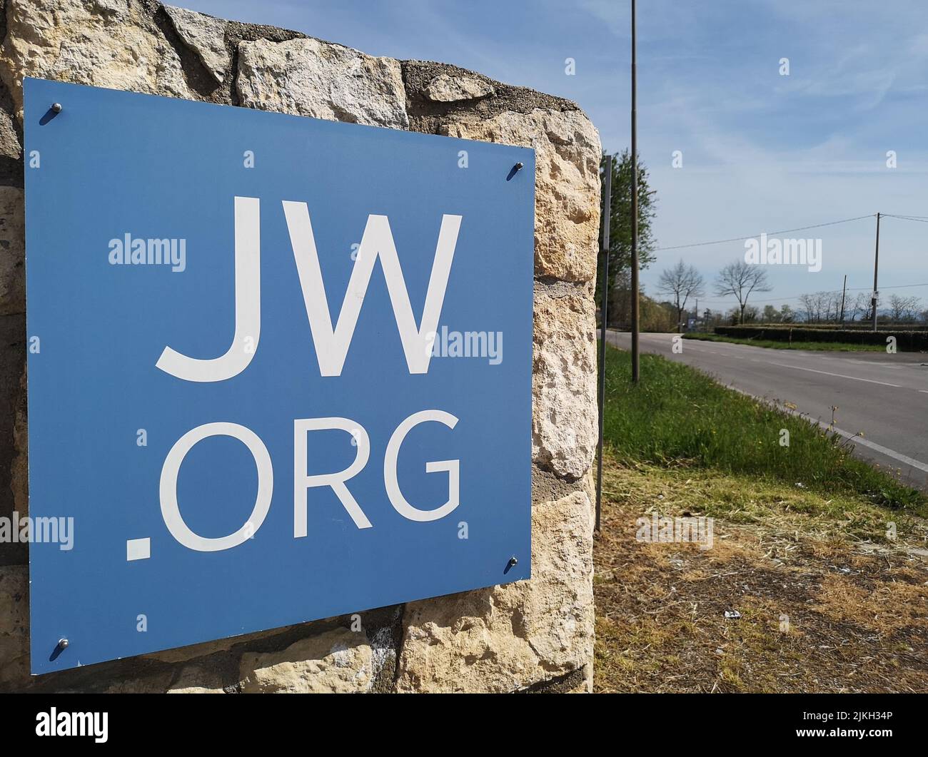 A closeup shot of a blue Jw.org plaque on a place of worship wall Stock Photo
