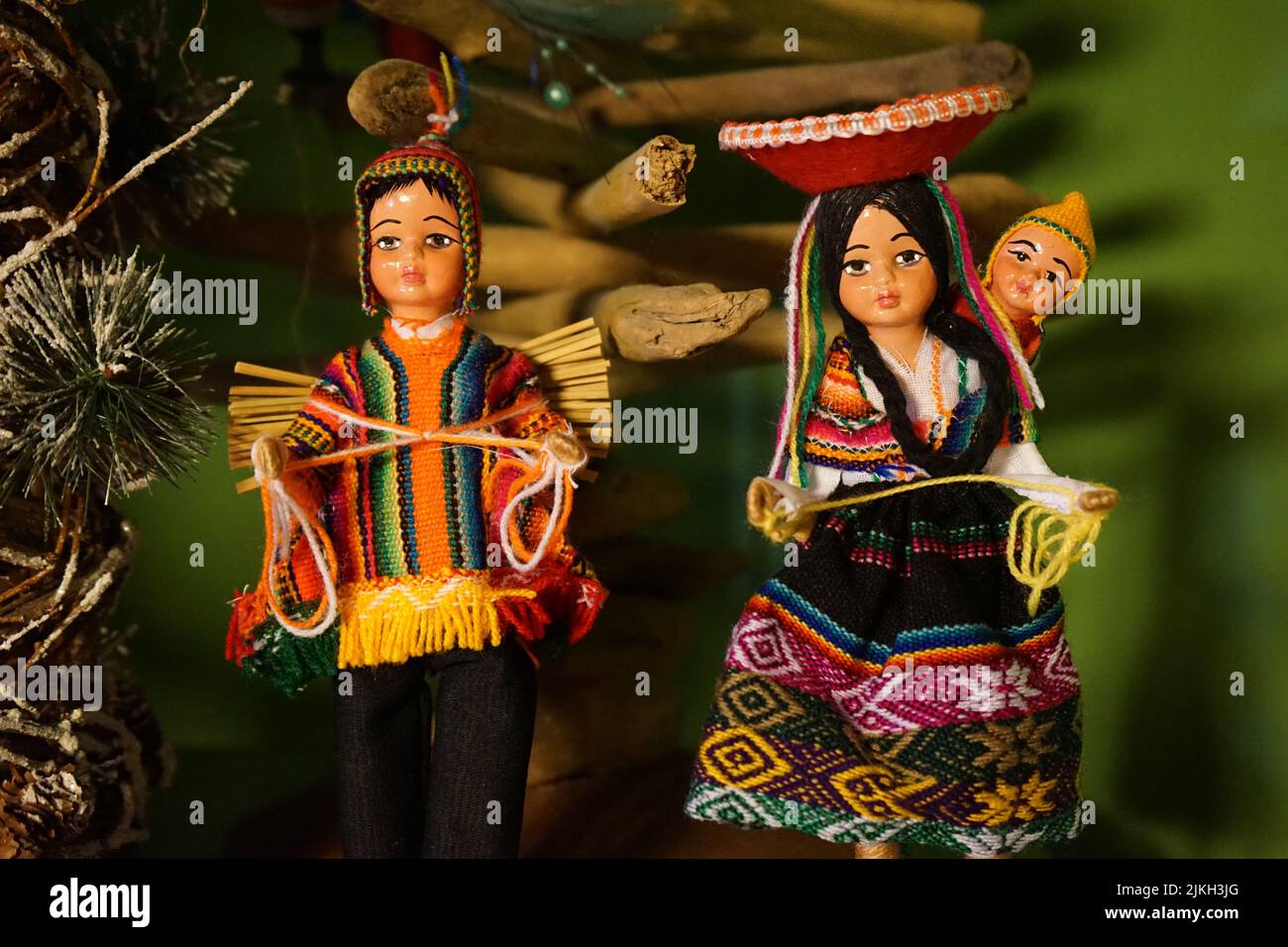 A close-up shot of two dolls in Peruvian costumes Stock Photo