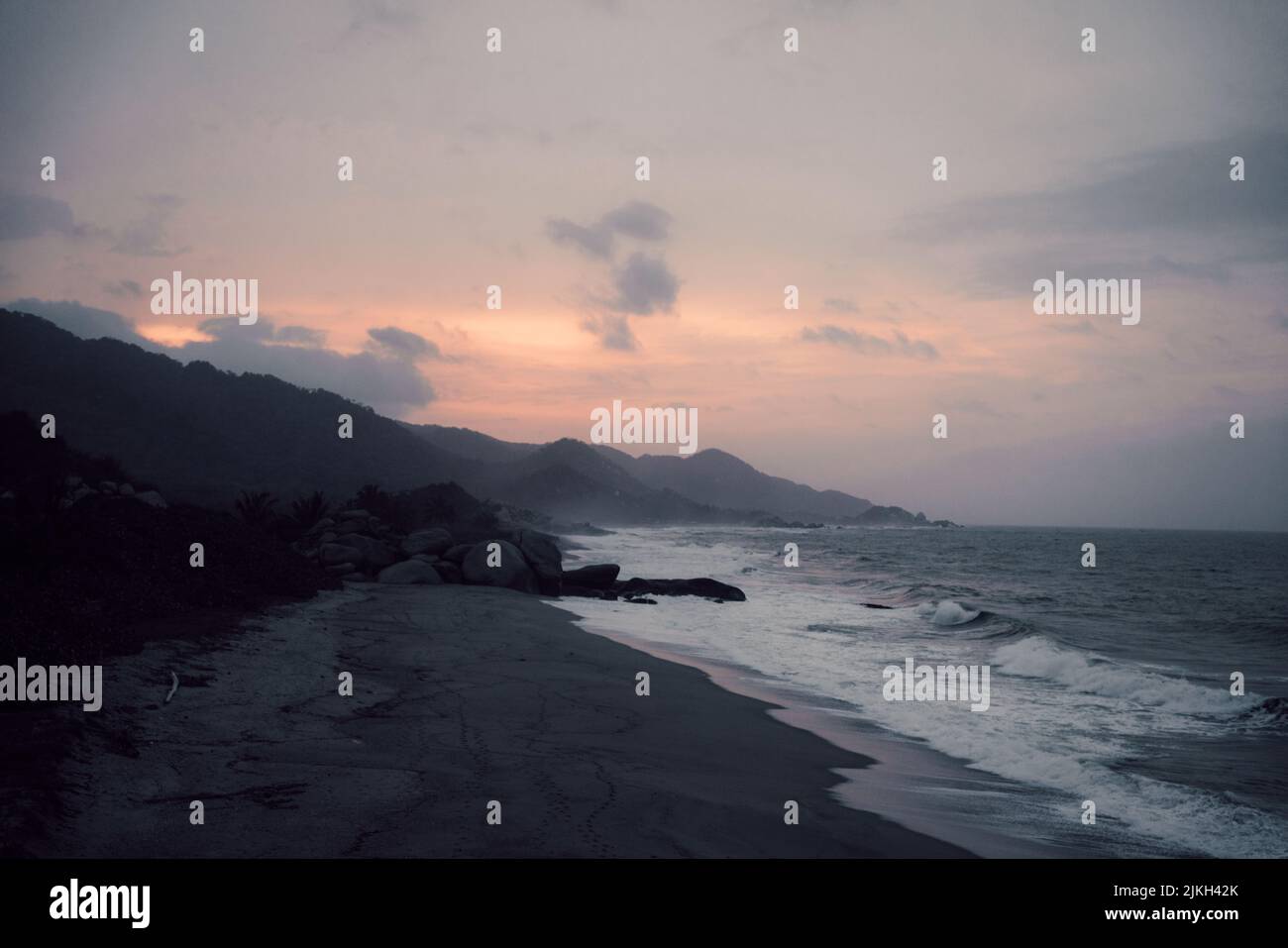 Rocky shore with sunset hi-res stock photography and images - Alamy