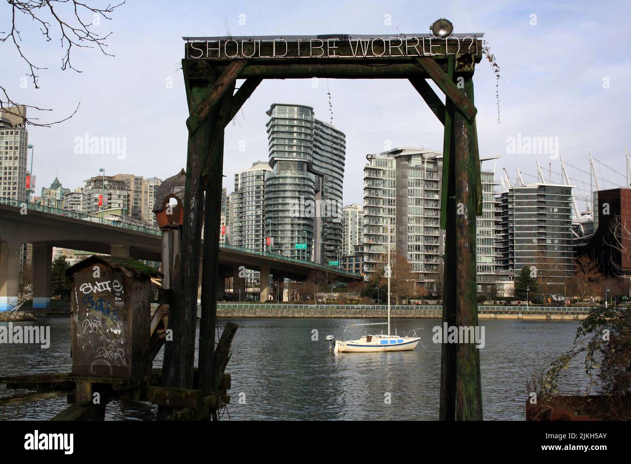 A Wooden structure, boat at False Creek and downtown Vancouver. British Columbia, Canada Stock Photo