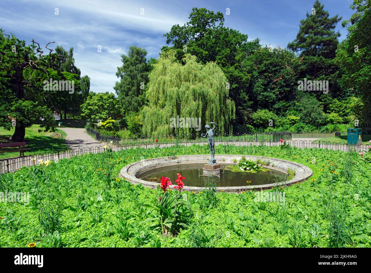 Flower bed and pond, Thompsons Park, Canton, Cardifff, Wales. Stock Photo