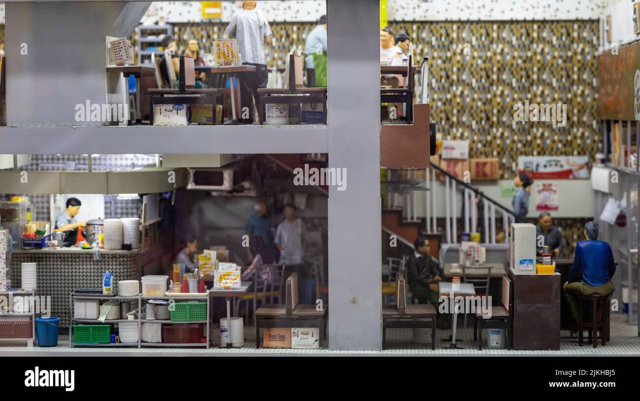 A miniature toy exhibition of a busy restaurant in Hong Kong Stock