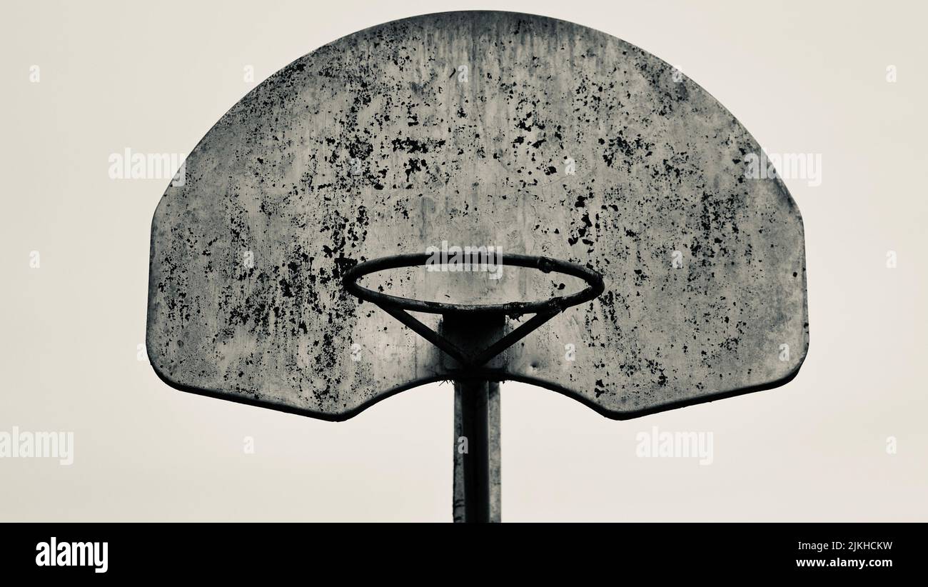 A grayscale closeup shot of a vintage basketball rim and a backboard with no net Stock Photo Alamy