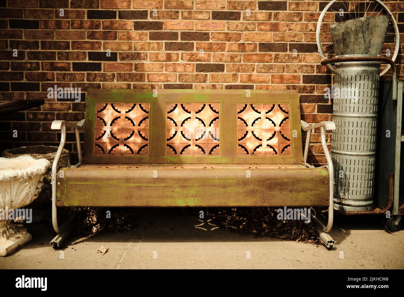Bench in front of wall hi-res stock photography and images - Alamy