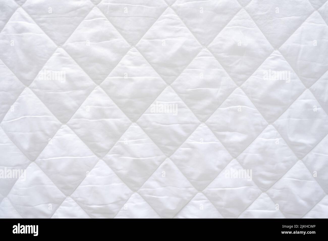 A closeup shot of the white mattress texture Stock Photo