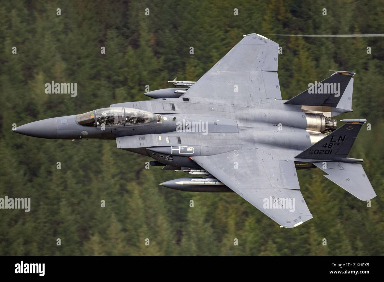 A USAF F15E jet training in the Mach Loop, North Wales, UK Stock Photo