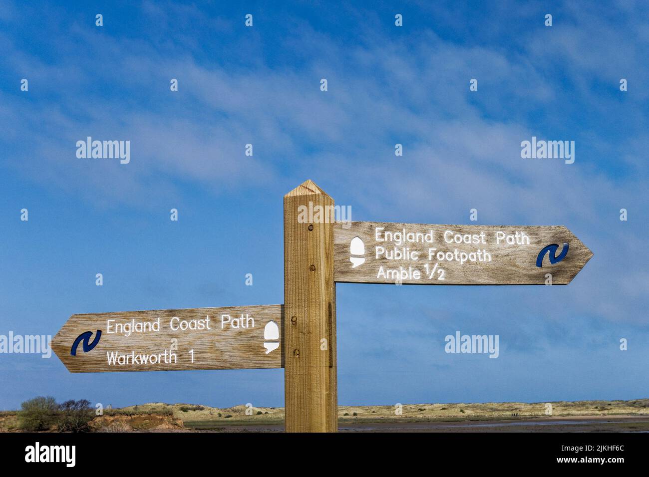 Signpost showing the England Coast Path between Amble and Warkworth in Northumberland, UK Stock Photo