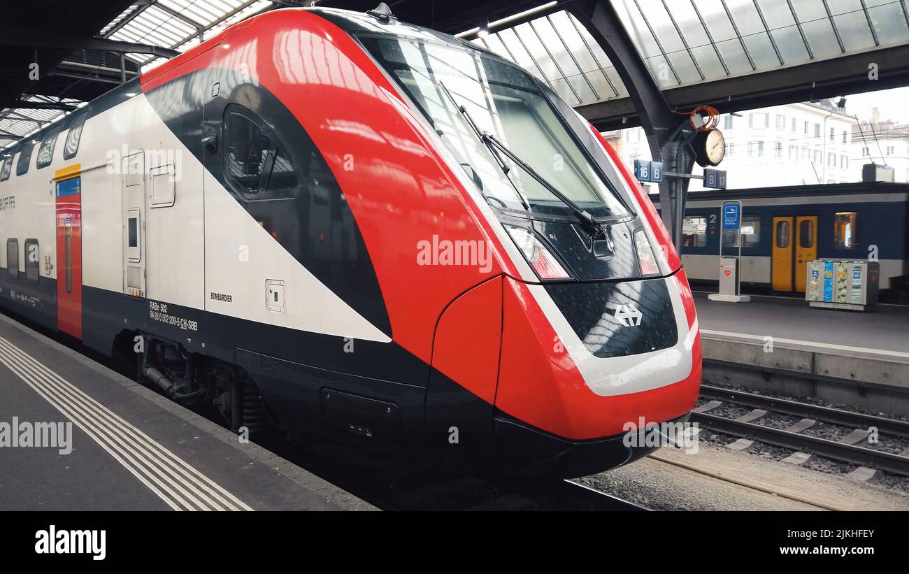 Modern electric train standing at the train station in Zurich