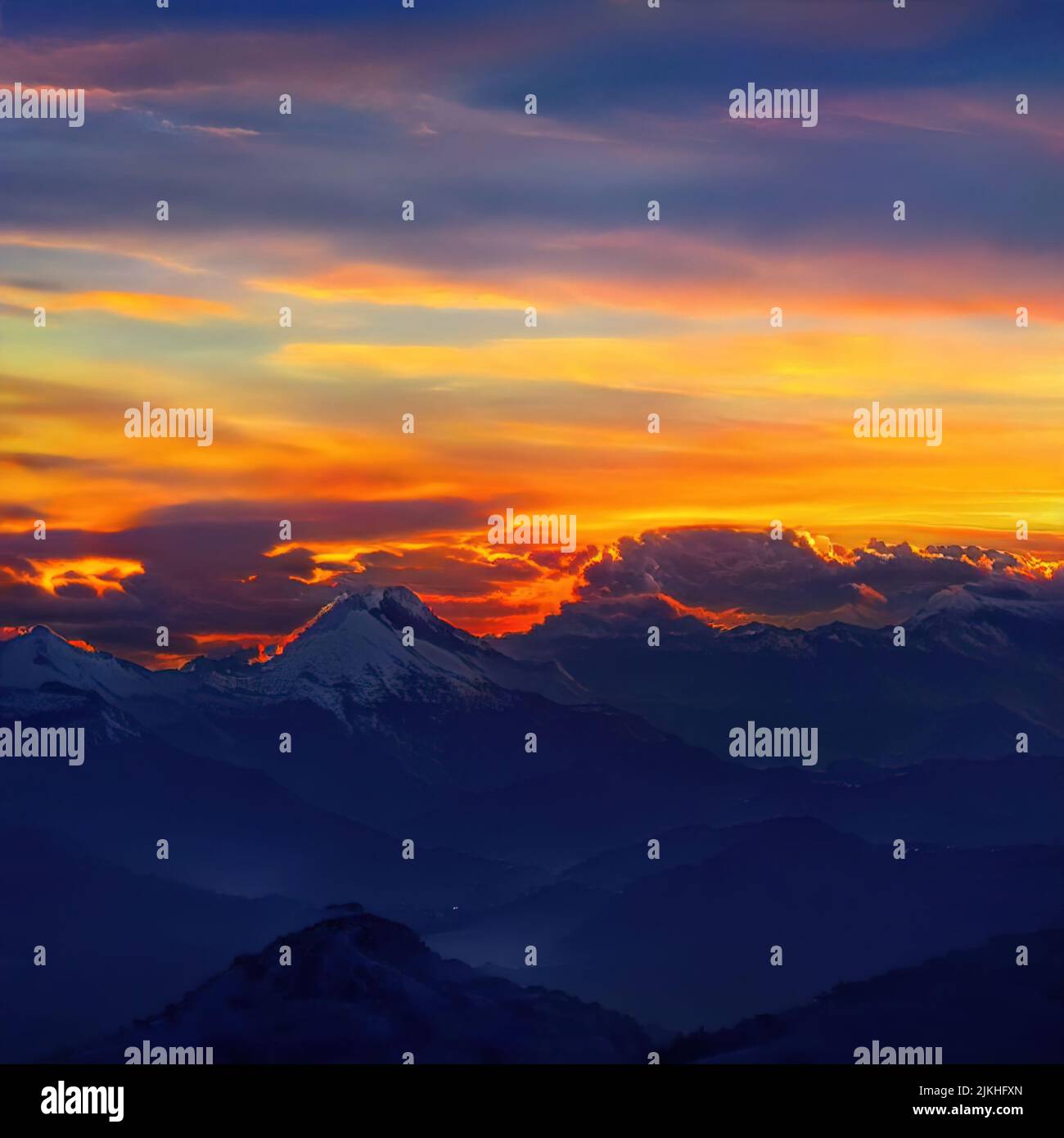 A scenic view of a beautiful sunset above a snowy mountain range Stock ...