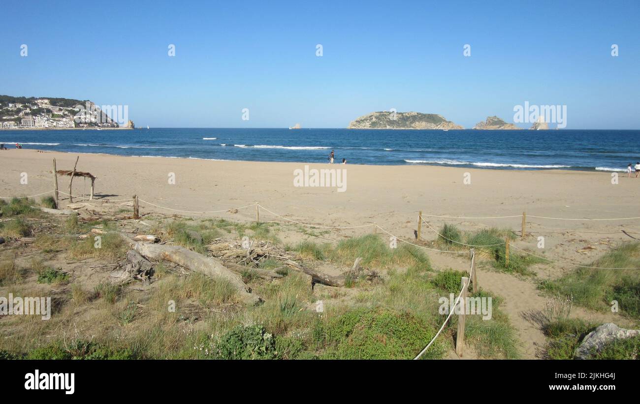 Jkhg A beautiful view of a sandy beach in Medes Islands, Costa Brava ...