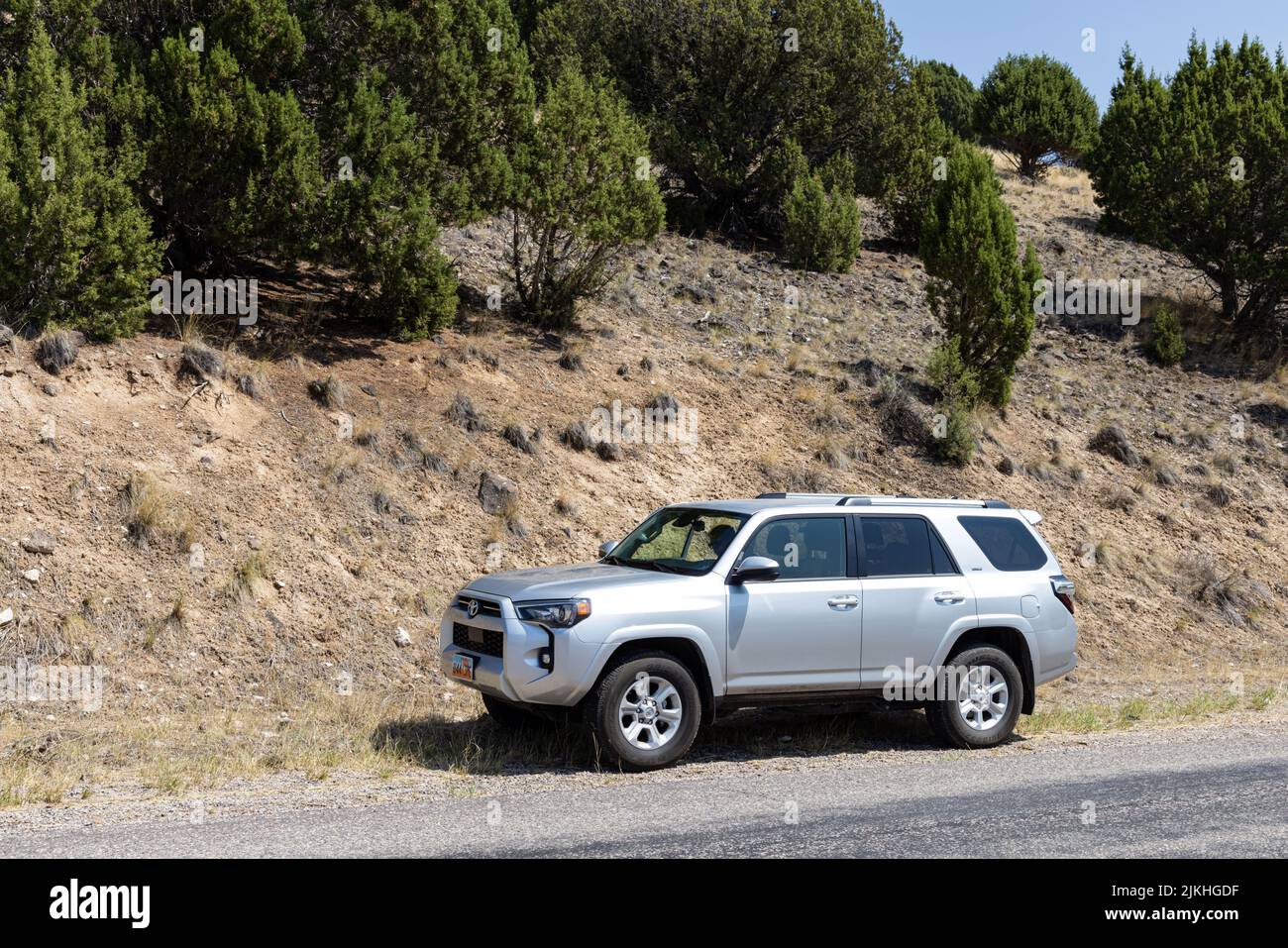 A gray Toyota 4 runner SUV on a mountain drive Stock Photo