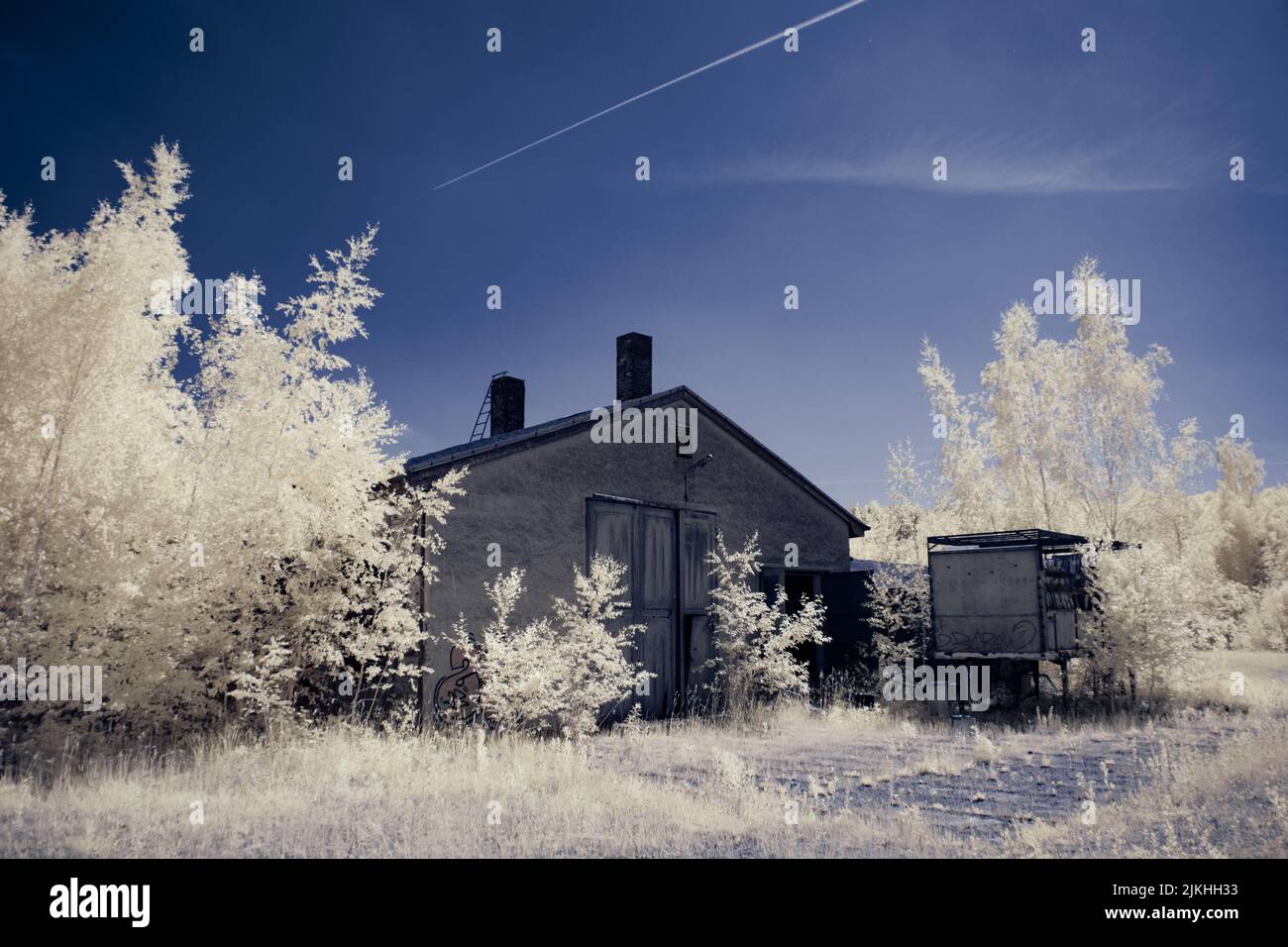 A landscape with snowy trees under sky with clouds Stock Photo - Alamy