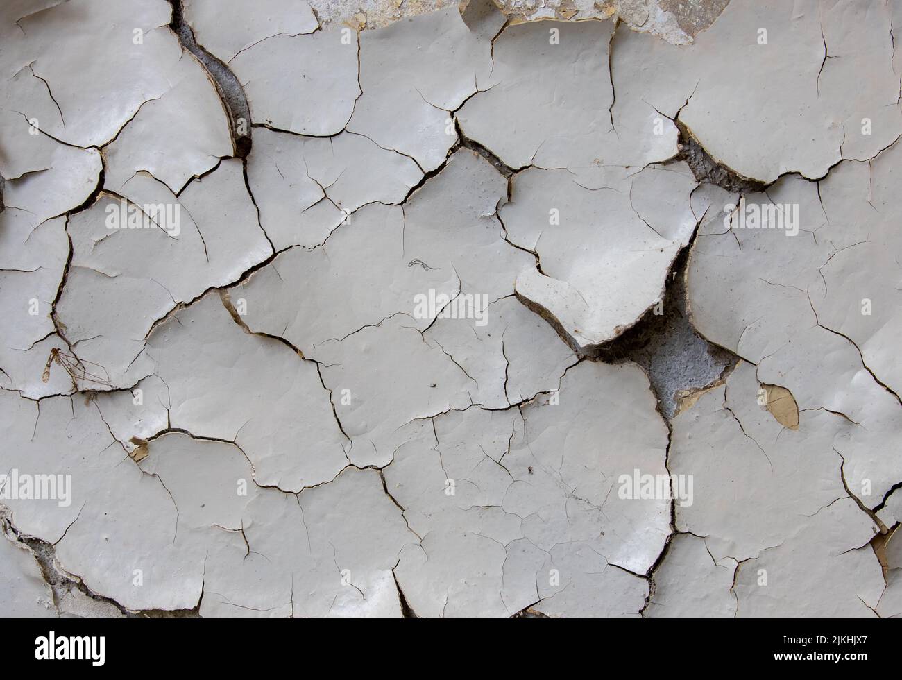 a closeup with a wall with peeling paint Stock Photo