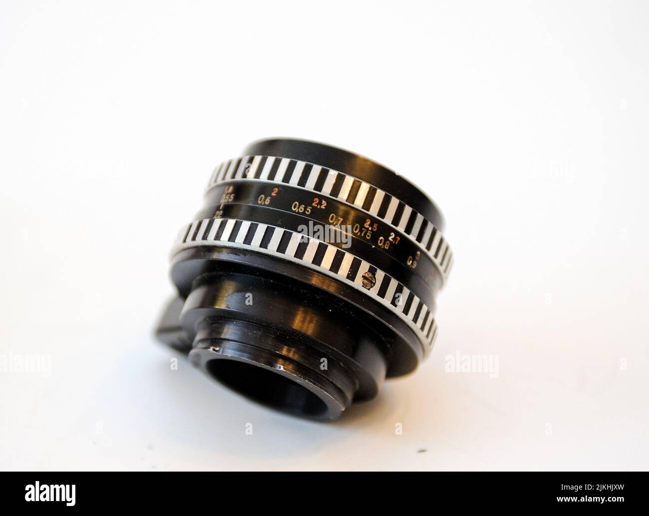 The lens of a vintage camera isolated on a white background Stock Photo ...